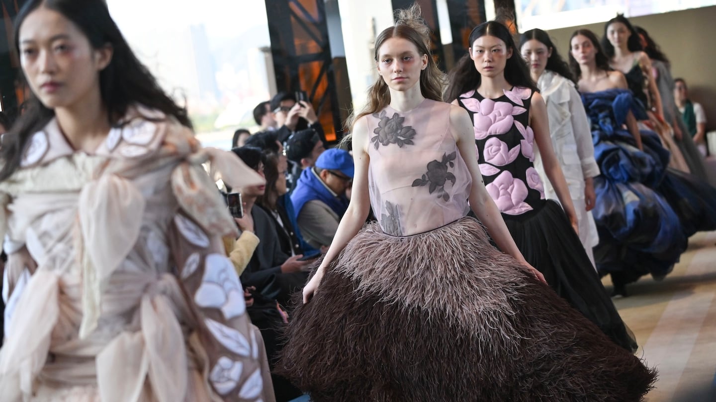 Models for Reverie by Caroline Hú walk the runway.